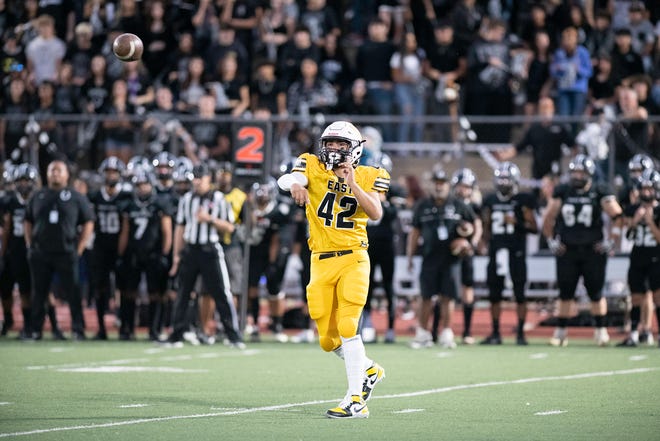 Pueblo East's Domnick Sierra throws a sideline pass during the 2023 Cannon Game against Pueblo South at Dutch Clark Stadium on Friday, September 22, 2023.