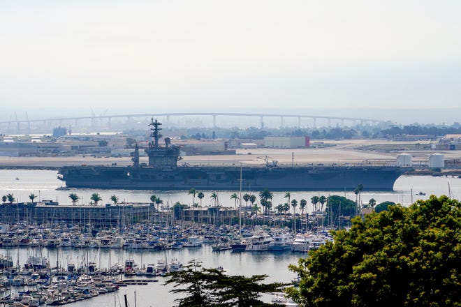 The USS Nimitz (CVN 68) departs San Diego Bay, Saturday, Aug. 19, 2023, at Mission Beach, in San Diego, ahead of Hurricane Hilary.